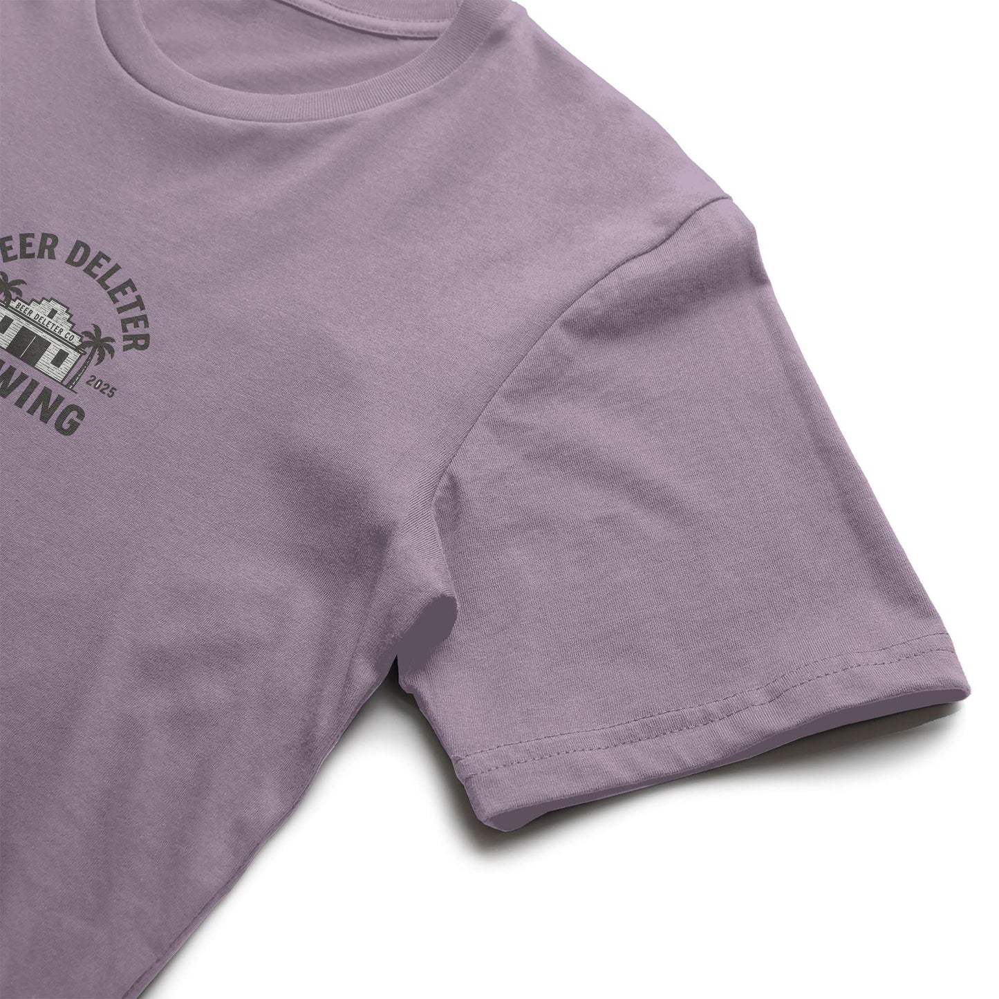 Purple t-shirt with a small graphic on a white background