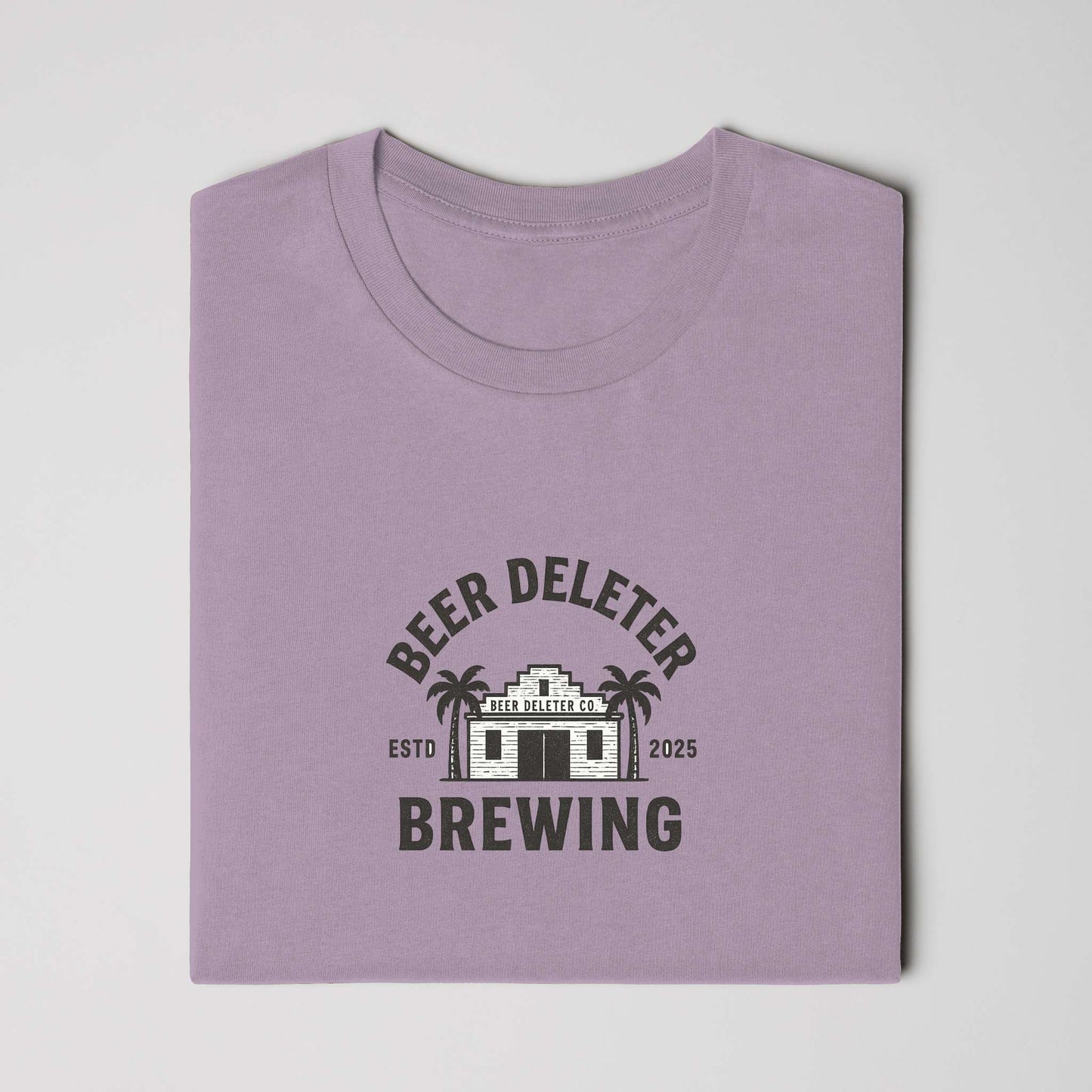 Folded purple t-shirt with 'Beer Deleter Brewing' graphic on a  white background