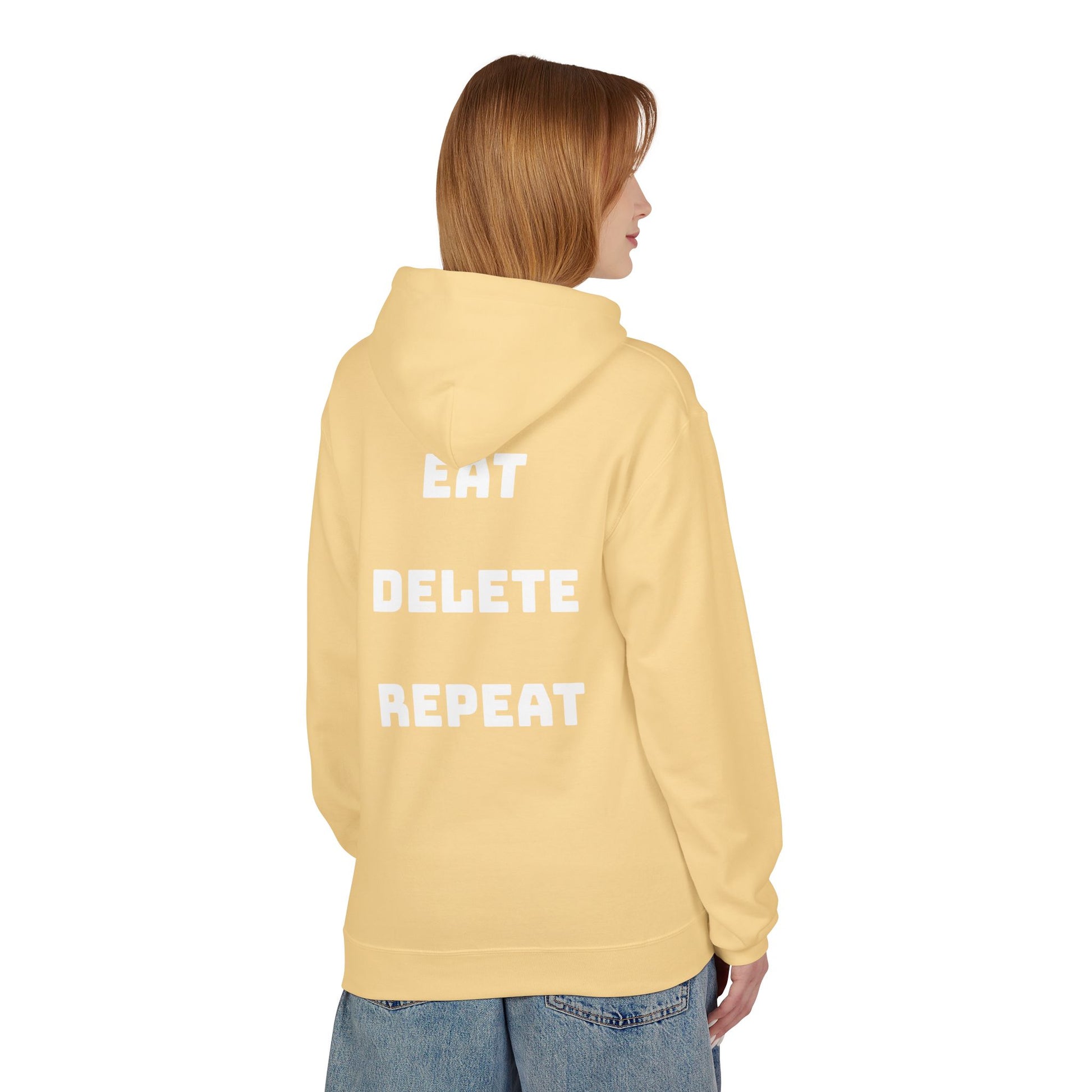Person wearing a yellow hoodie with 'EAT DELETE REPEAT' text on the back, standing against a white background.